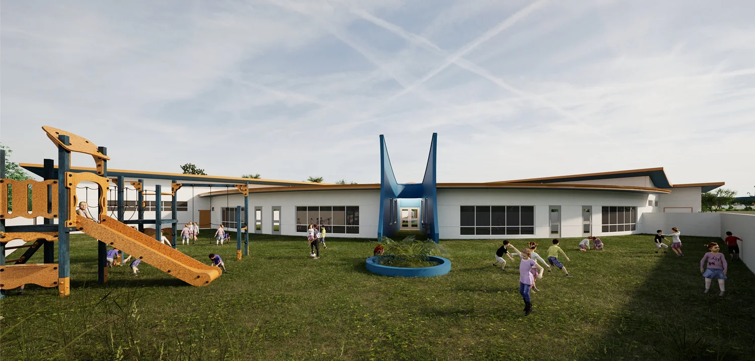 Children running and climbing on the wooden playground beside the center's classroom wing